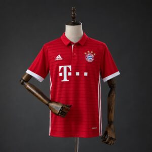 Camiseta Bayern Múnich 2016-2017 local roja con líneas horizontales, cuello polo y patrocinador Telekom