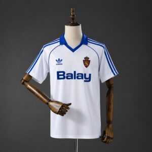 Camiseta Real Zaragoza 1986-1987 local blanca con cuello azul, franjas Adidas y patrocinador Balay