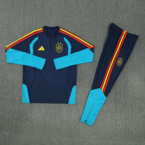 Chándal España 2026-2027 Heritage extendido con sudadera azul marino y pantalón con franjas rojas y amarillas