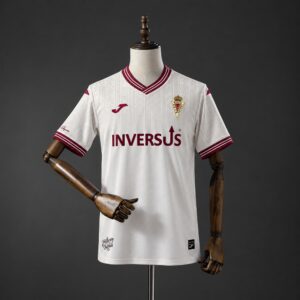 Camiseta Real Murcia 2026-2027 visitante color tierra claro con cuello de pico grana